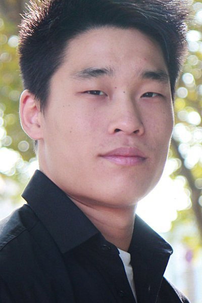 Kai Fung Rieck as Wang Lee in Flashback Cops