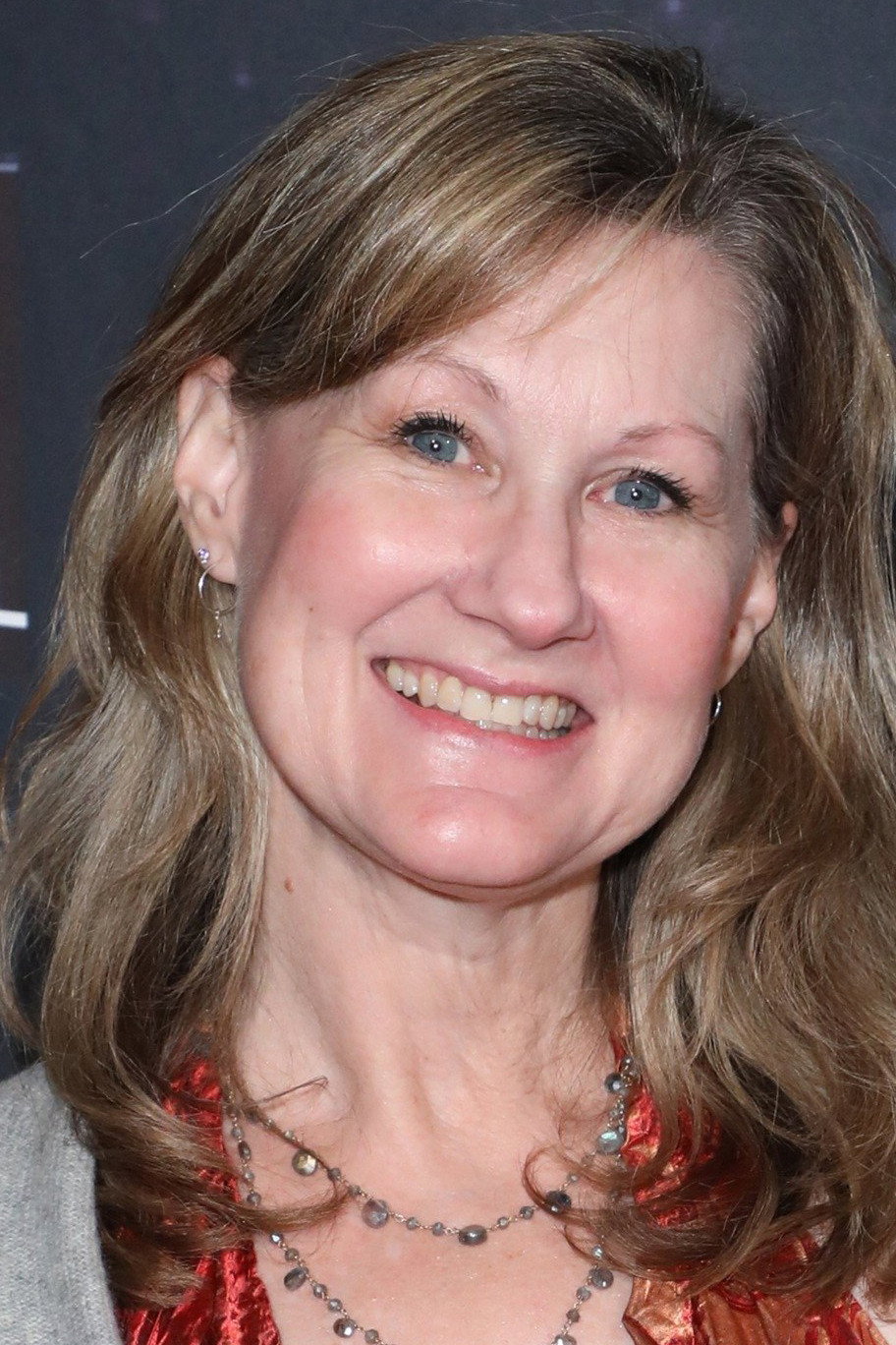 Veronica Taylor as April O'Neil (voice) in Teenage Mutant Ninja Turtles
