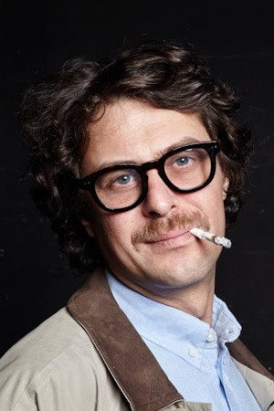 Miloš Vlalukin as Knjižar Stamenković in Pearlescent Fog