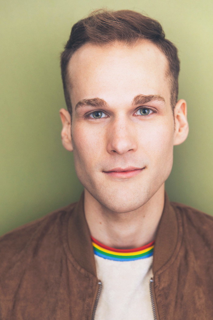 Eddie Carroll as Elliot in Red Velvet