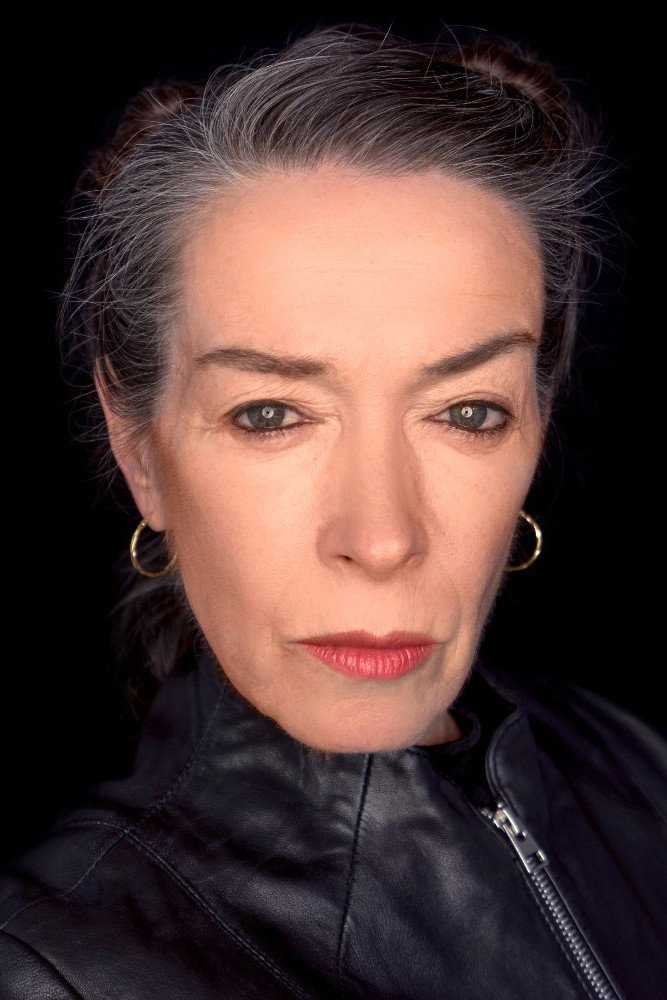 Adrienne Pearce as Puttnam in The Red Phone: Checkmate