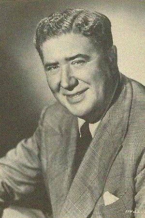 Quentin Reynolds as American Journalist in Golden Earrings