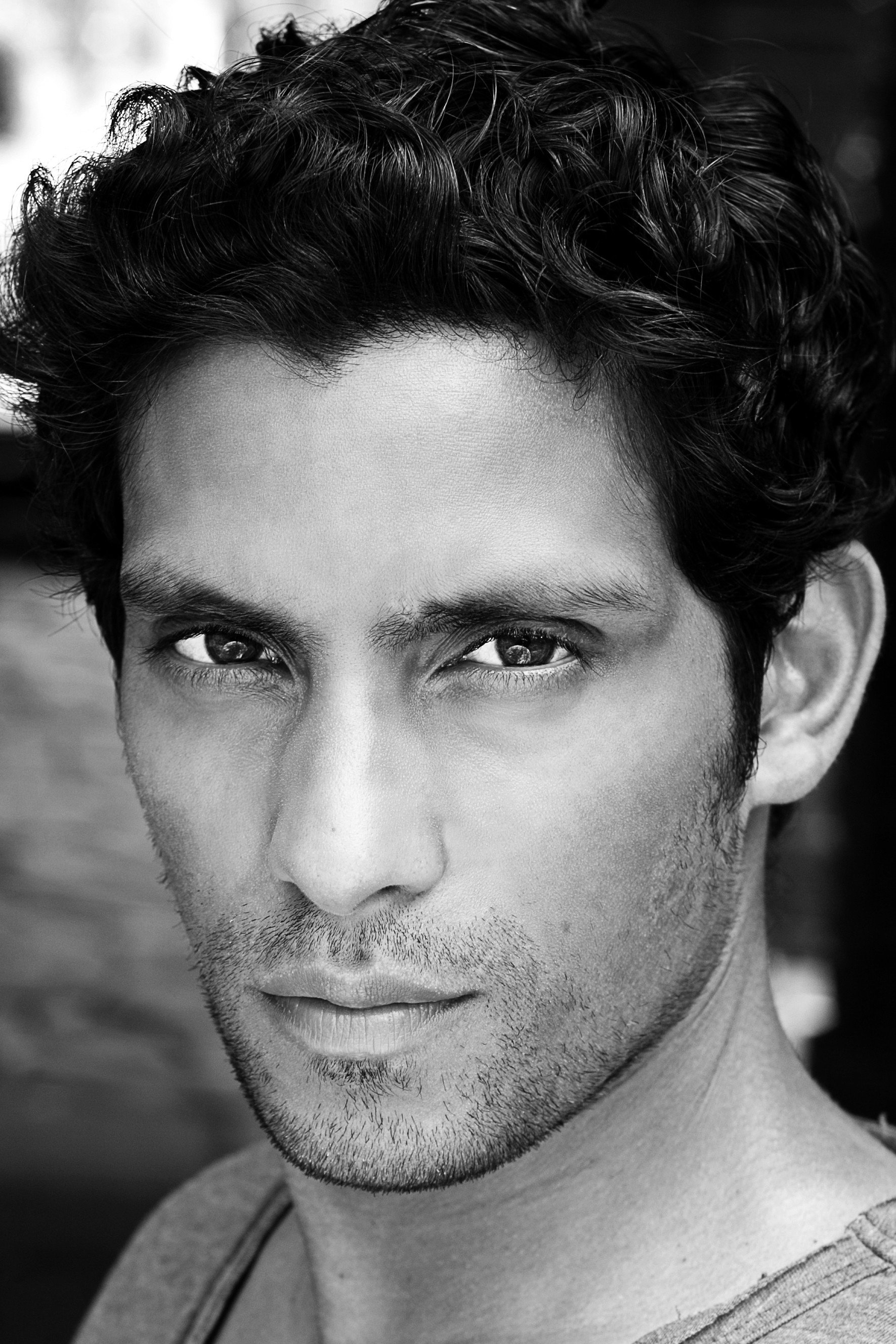 Shane Zaza as Nikhil Kapur in Invasion