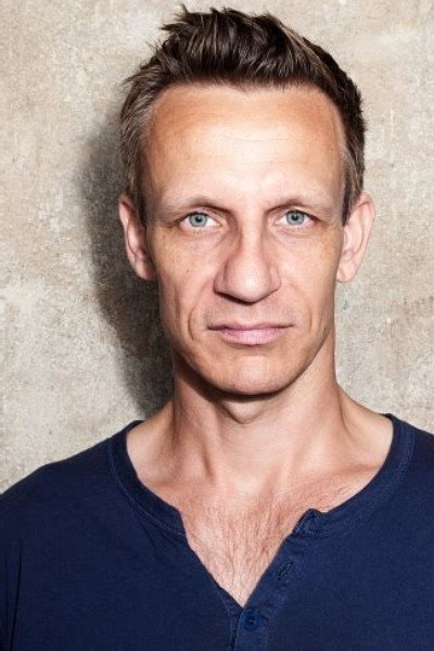 Mike Hoffmann as Andreas Haller in Paths