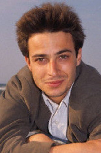 Simon de La Brosse as Sylvain in Pauline à la plage