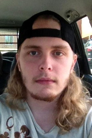 Holden McNeil as Video Store Clerk in Playdurizm