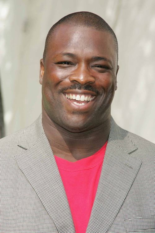 Reginald Ballard as Phil in Boosters LA