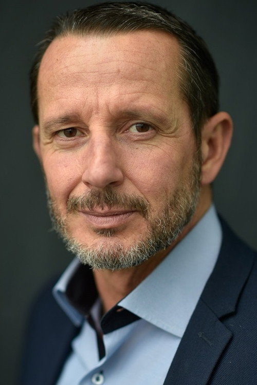 Erico Salamone as Juge d'Instruction in Les Gentils