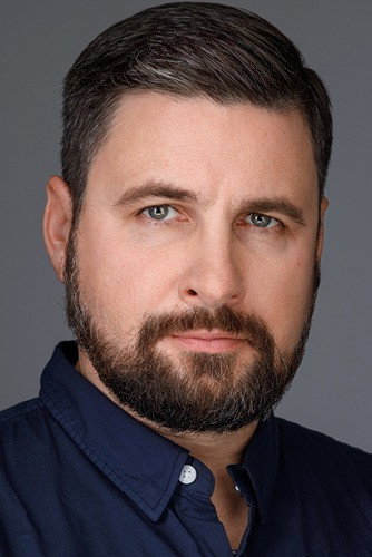 Ilja Nartov as Truck Driver in The End of the Chain