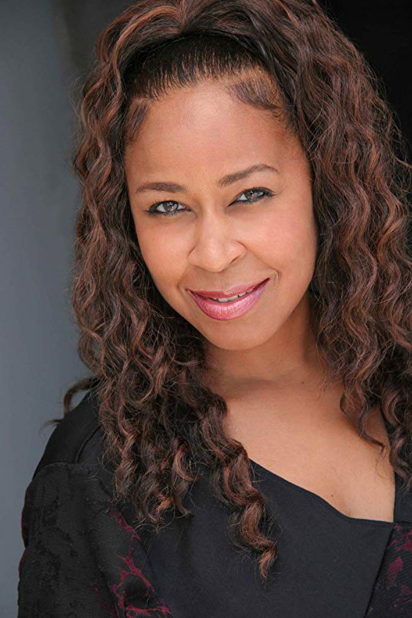 Blaise Brooks as Lena in The Work Wife