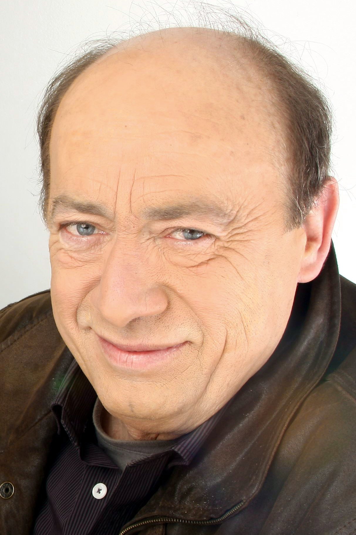 Étienne Chicot as Koenig in Man & Wife, Cop & Crook