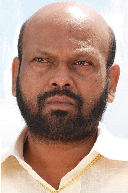 Rami Reddy as Durga Prasad in Dharma Kshetram