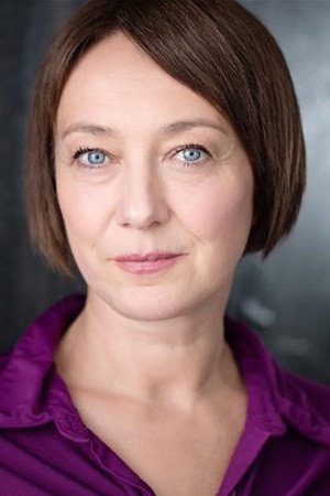 Portia Booroff as Miss Woods in Room 36