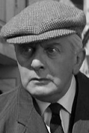 Stringer Davis as Jim Stringer in Murder at the Gallop
