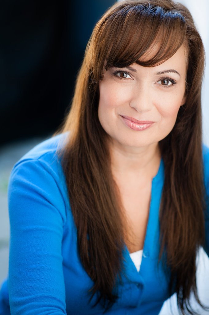 Ashley Michaels as Nora in Tornado Valley