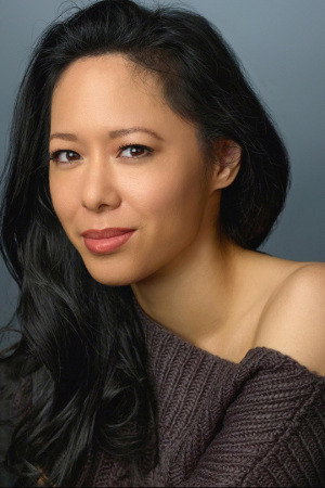 Wen Yann Shih as Cyndi Chan (Ryan's Mom) in Timecop 2: The Berlin Decision