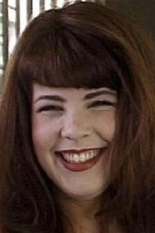 Holli Woods as (archive footage) in Head North