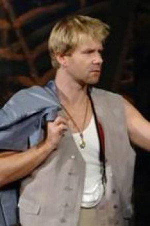 Dominik Łoś as Michał "Miś" Malinowski in Goodbye Rockefeller