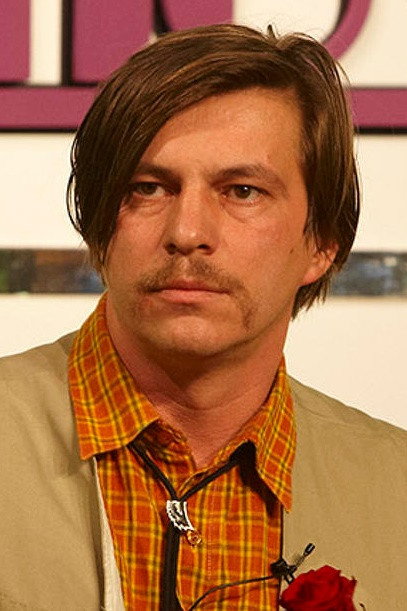 Mihály Szabados as Delivery Man in Stanleyville