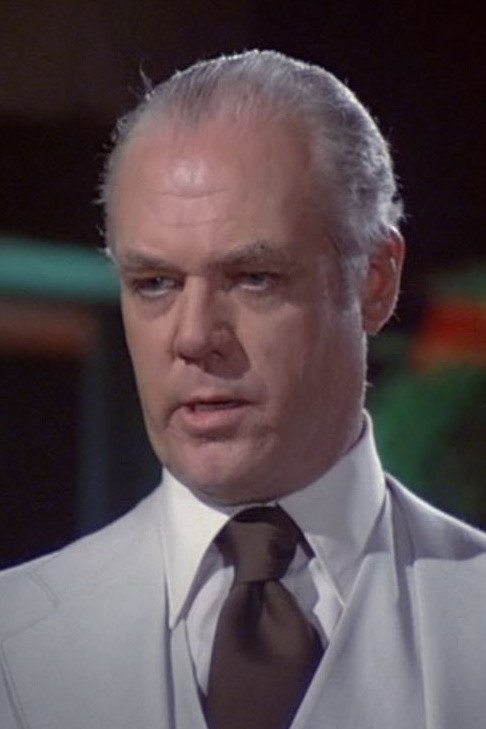 Peter Bromilow as Donovan in Programmed to Kill