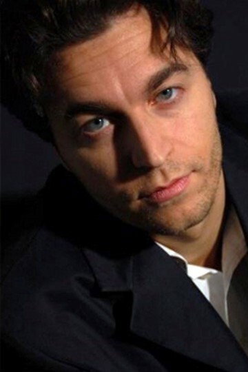 Paolo Salvadeo as Father Chuck Bennet in Devil Times Two