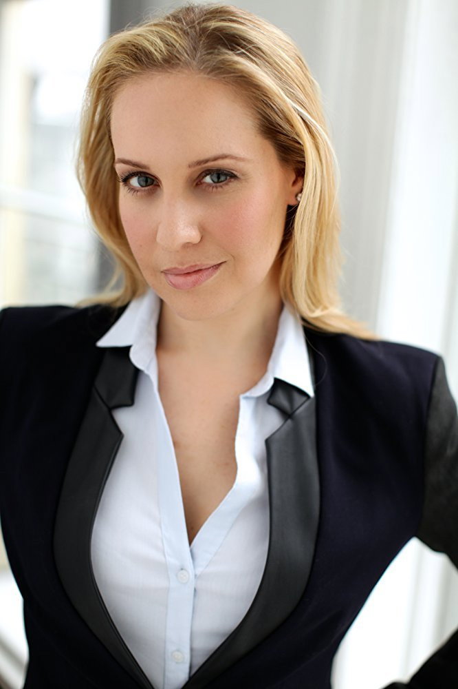 Kelly Karbacz as Joanie Binder in Regular Joe