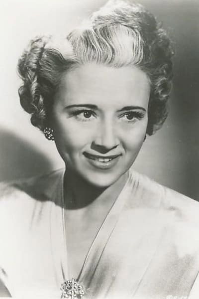 Bess Flowers as Hortense Towers in Hollywood