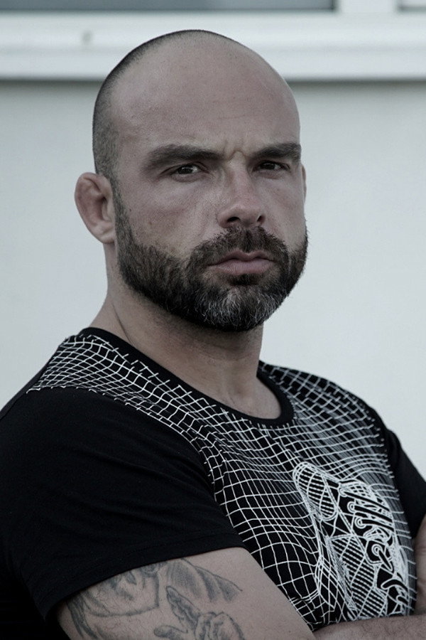 Dimitar Doychinov as Kaz in Kill 'em All 2