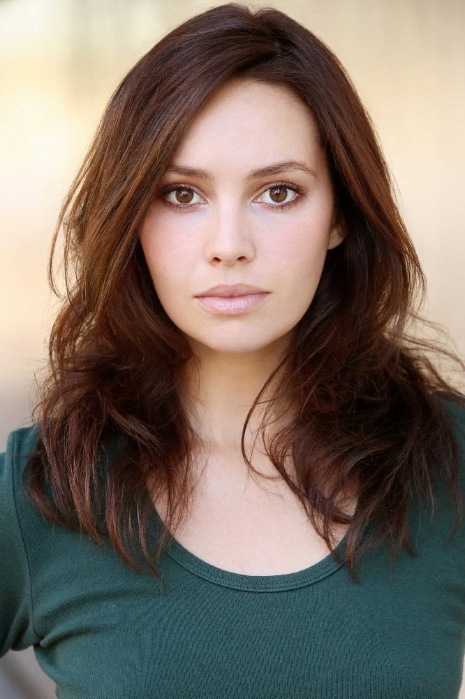 Emily O'Brien as Renee Chandler (voice) in Constantine: City of Demons