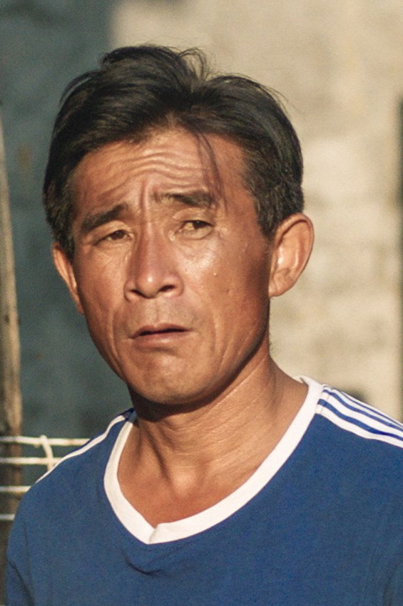 张占义 as Zhan Yi in Green Wave