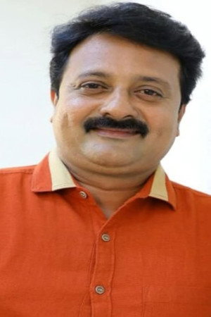 Rajesh Paravoor as Appukuttan in Swargathile Katturumbu