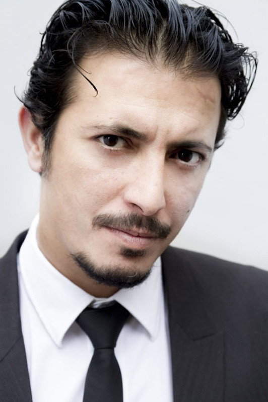 Hafid F. Benamar as Nabil Ben Mabrouk in Ghosts - Fantômes en héritage