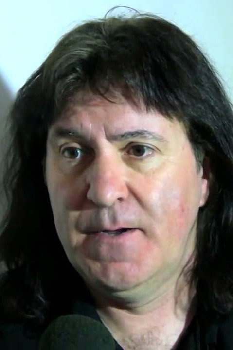 Simon Wright as Self in AC/DC - Plug Me In
