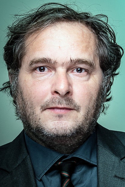 Martin Hug as Santos in Torn