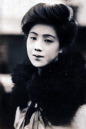 浦辺粂子 as Brothel Keeper in Wise Man's Grandchild