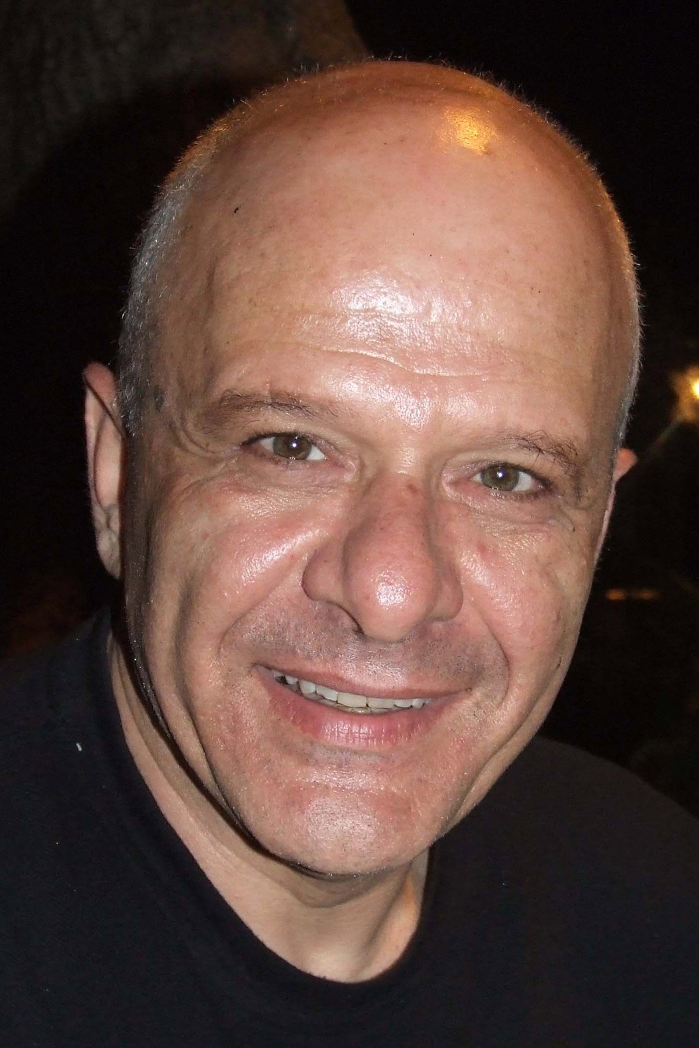 Yussuf Abu-Warda as Aziz in Mediterranean Fever