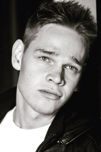 Jake Brown as Jake in Debt Collectors