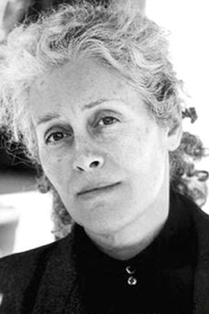 Daniela Caroli as Max's Companion in The Bloodstained Lawn