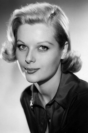 Margo Moore as Nora McKay in Wake Me When It's Over