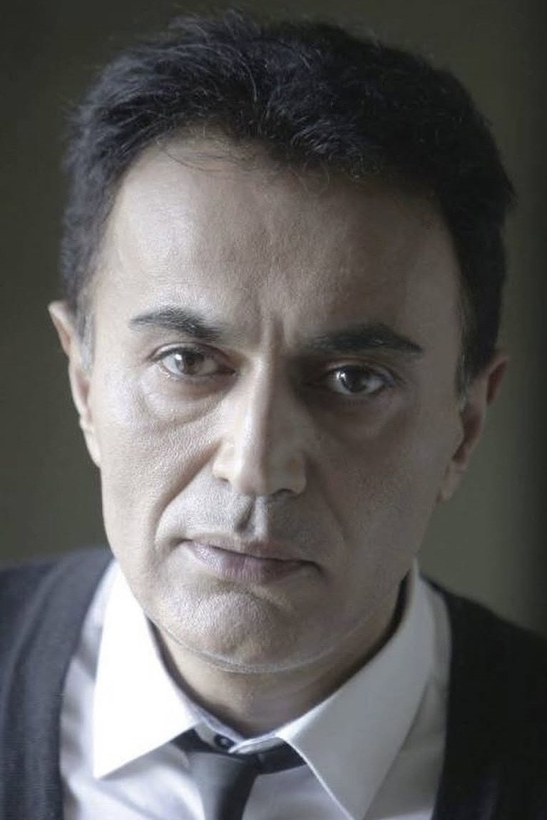 Firdovsi Atakişiyev as Elxan in The Tulip Palace