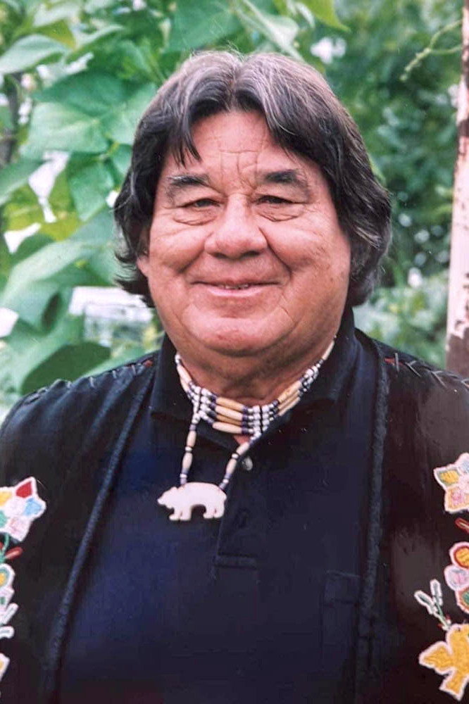 Billy Two Rivers as Ougebmat in Black Robe