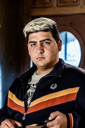 Sahin Avci as Nouri in Scratch My Back
