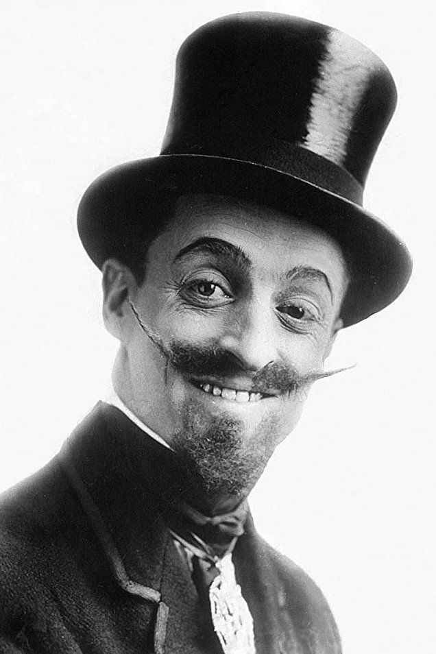 Leo White as The Burglar in The Girl, the Cop, the Burglar