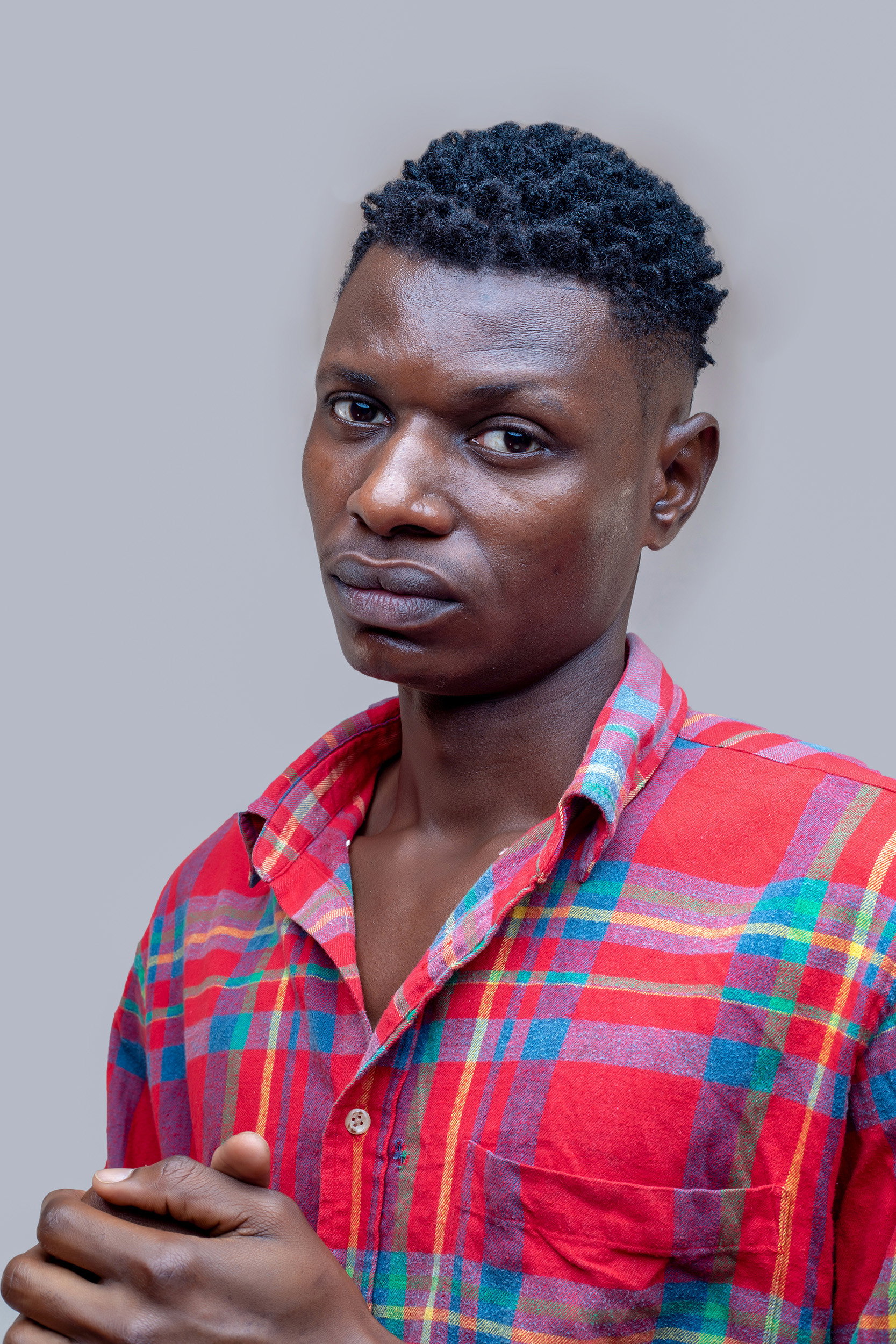 Brian Kirya Kibago as Michael Otim in Maid of Honor