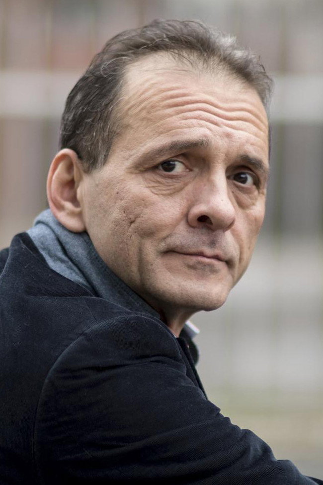 Kőszegi Ákos as Dr. Böcskei Richárd in Tóth János