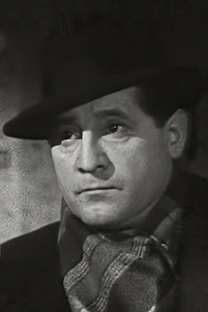 Henri Charrett as Inspector Vétillard in The Murderer Is Not Guilty