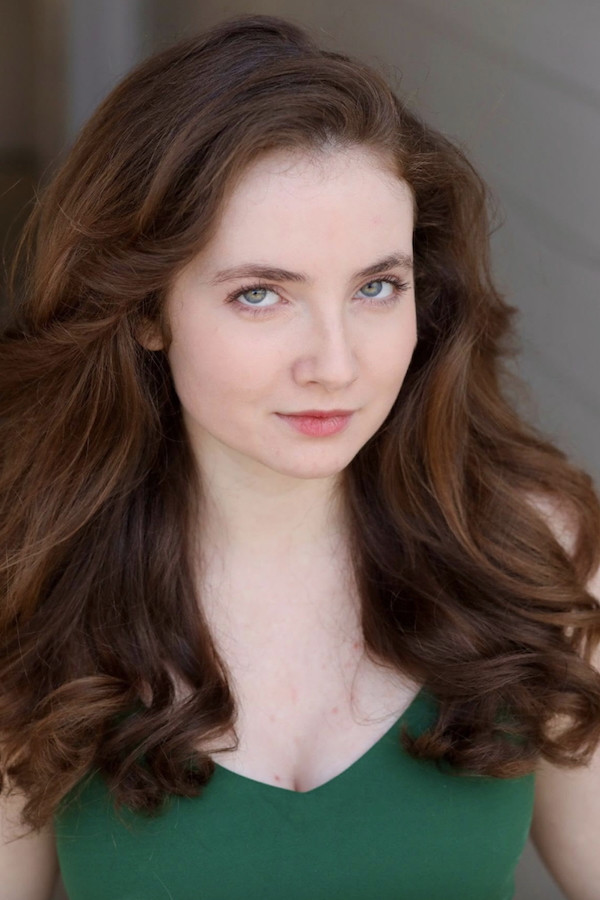 Josie Juliette Wert as Cara Bishop in Let's Murder Like It's 1999!