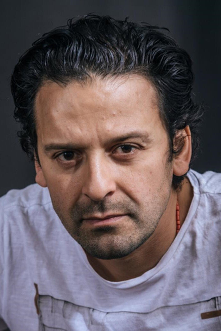 Khaled Benaissa as Man on the Bus #1 in Mascarades