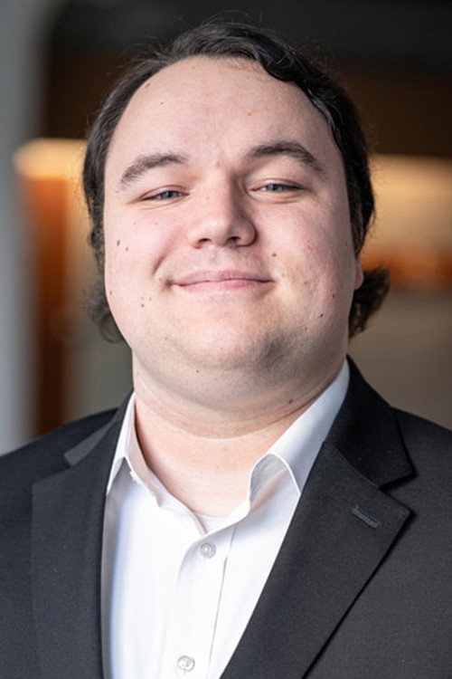 Tom Zavertnik as Taxi Driver in The Family Business