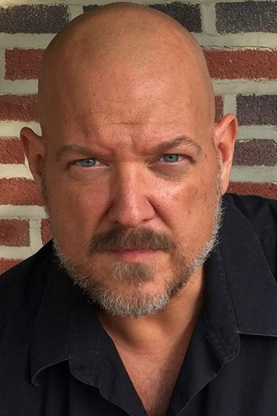 John Jezior as Detective in Stealing a Survivor